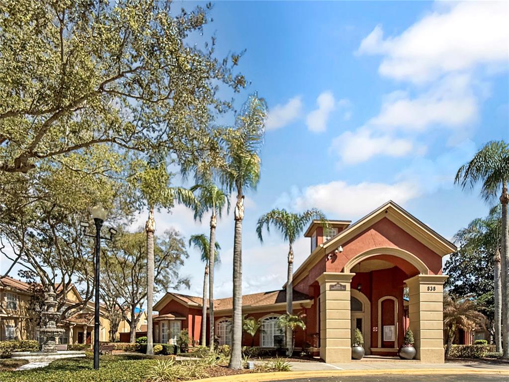 860 Grand Regency Pointe, Unit 200 Altamonte Springs, FL 32714 - Photo 16 of 23 a view of a building and a trees