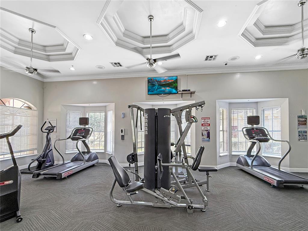 860 Grand Regency Pointe, Unit 200 Altamonte Springs, FL 32714 - Photo 17 of 23 a view of a room with gym equipment