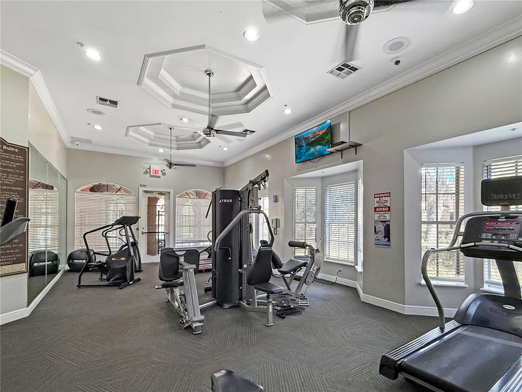 860 Grand Regency Pointe, Unit 200 Altamonte Springs, FL 32714 - Photo 18 of 23 a view of a room with gym equipment