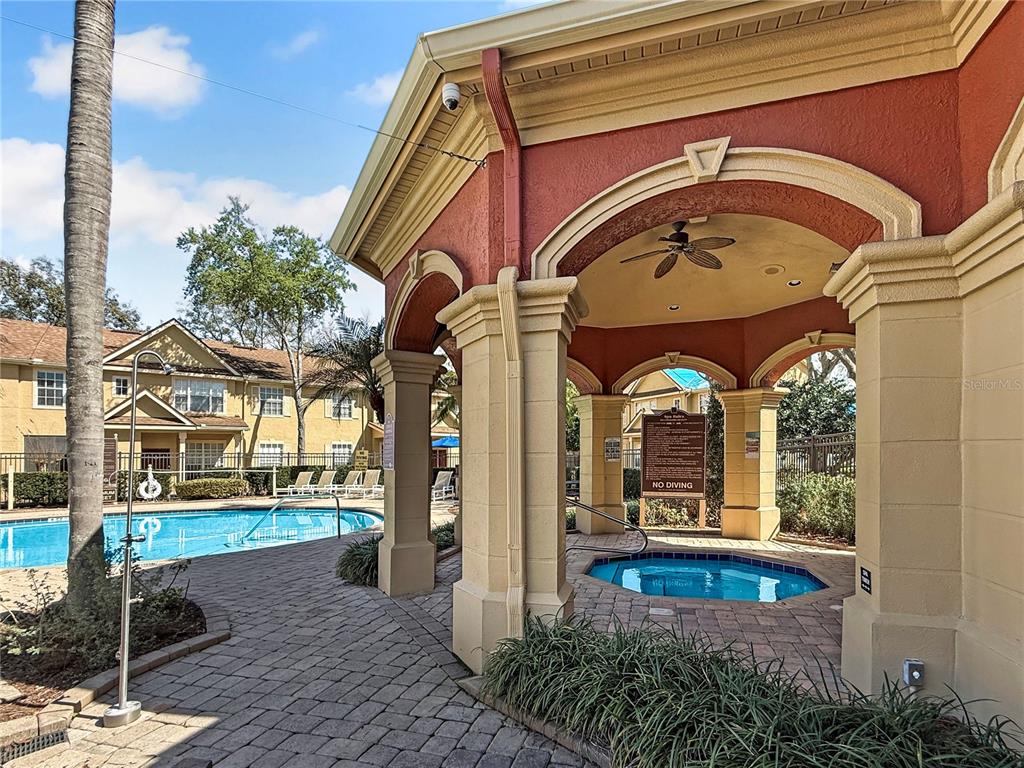 860 Grand Regency Pointe, Unit 200 Altamonte Springs, FL 32714 - Photo 23 of 23 a view of a building with a porch