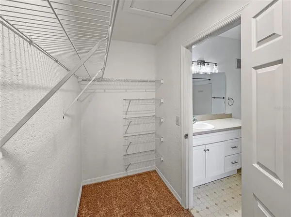 a bathroom with a sink and vanity