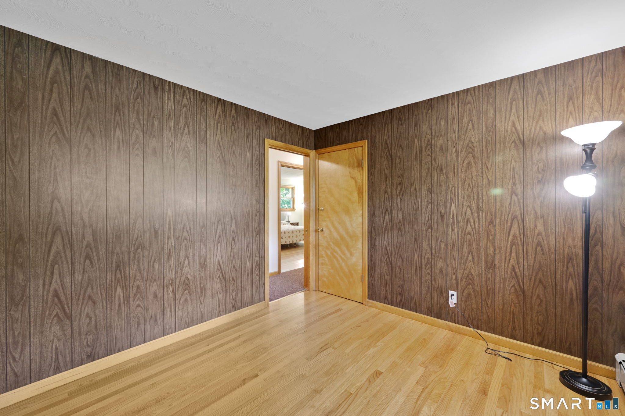 158 Notch Road Granby, CT 06035 - Photo 18 of 40 a view of an empty room with wooden floor