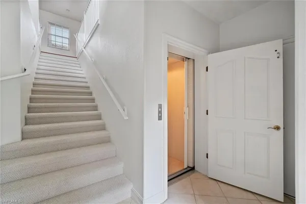 a view of entryway with a front door
