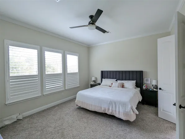 a view of a dining room with furniture and window