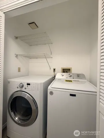 a utility room with dryer and washer
