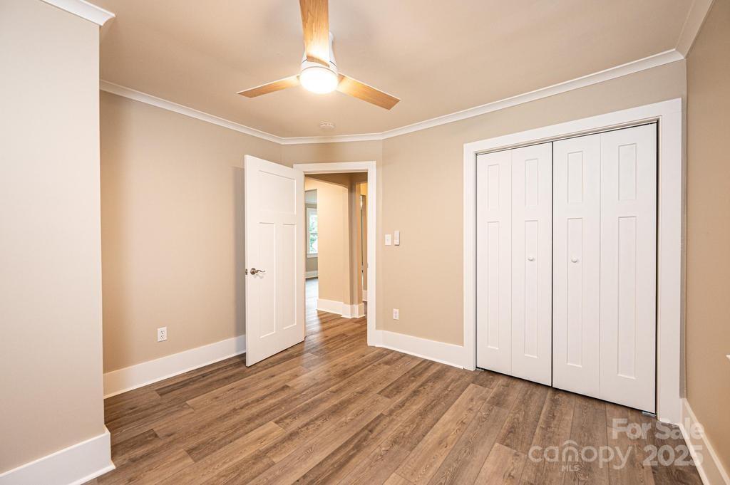 1105 Wildwood Road Lenoir, NC 28645 - Photo 27 of 38 a view of an empty room with wooden floor