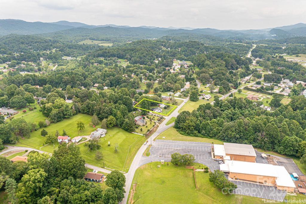 1105 Wildwood Road Lenoir, NC 28645 - Photo 37 of 38 an aerial view of residential houses with outdoor space