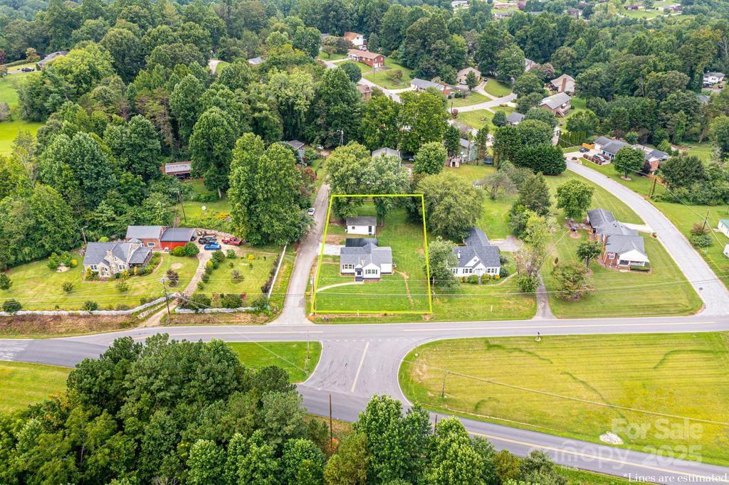 1105 Wildwood Road Lenoir, NC 28645 - Photo 38 of 38 an aerial view of a swimming pool with yard