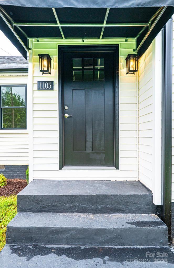 1105 Wildwood Road Lenoir, NC 28645 - Photo 4 of 38 a view of entryway door of the house