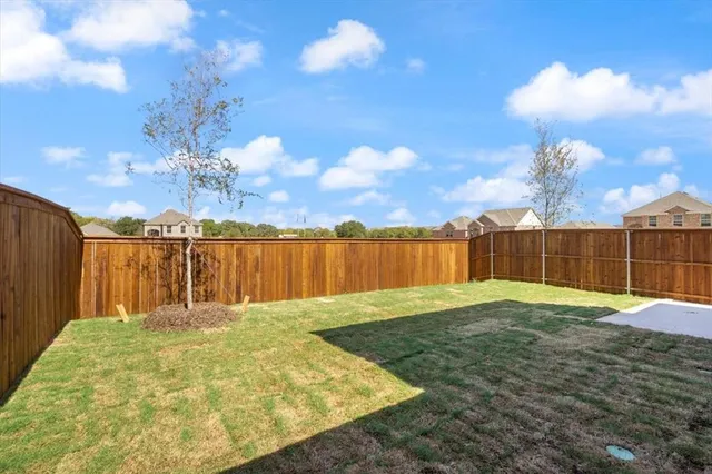 a view of swimming pool with a yard