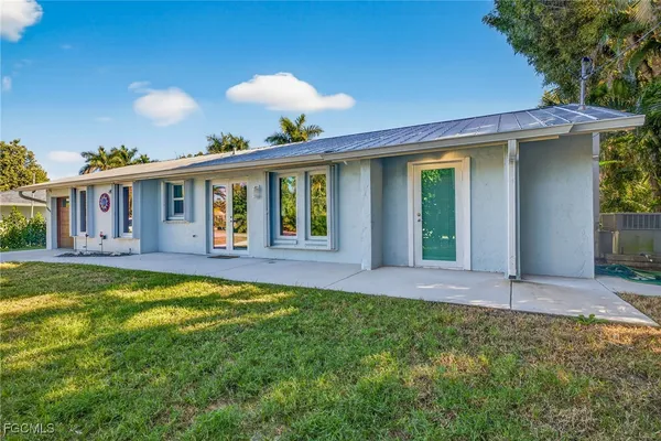 front view of a house with a yard
