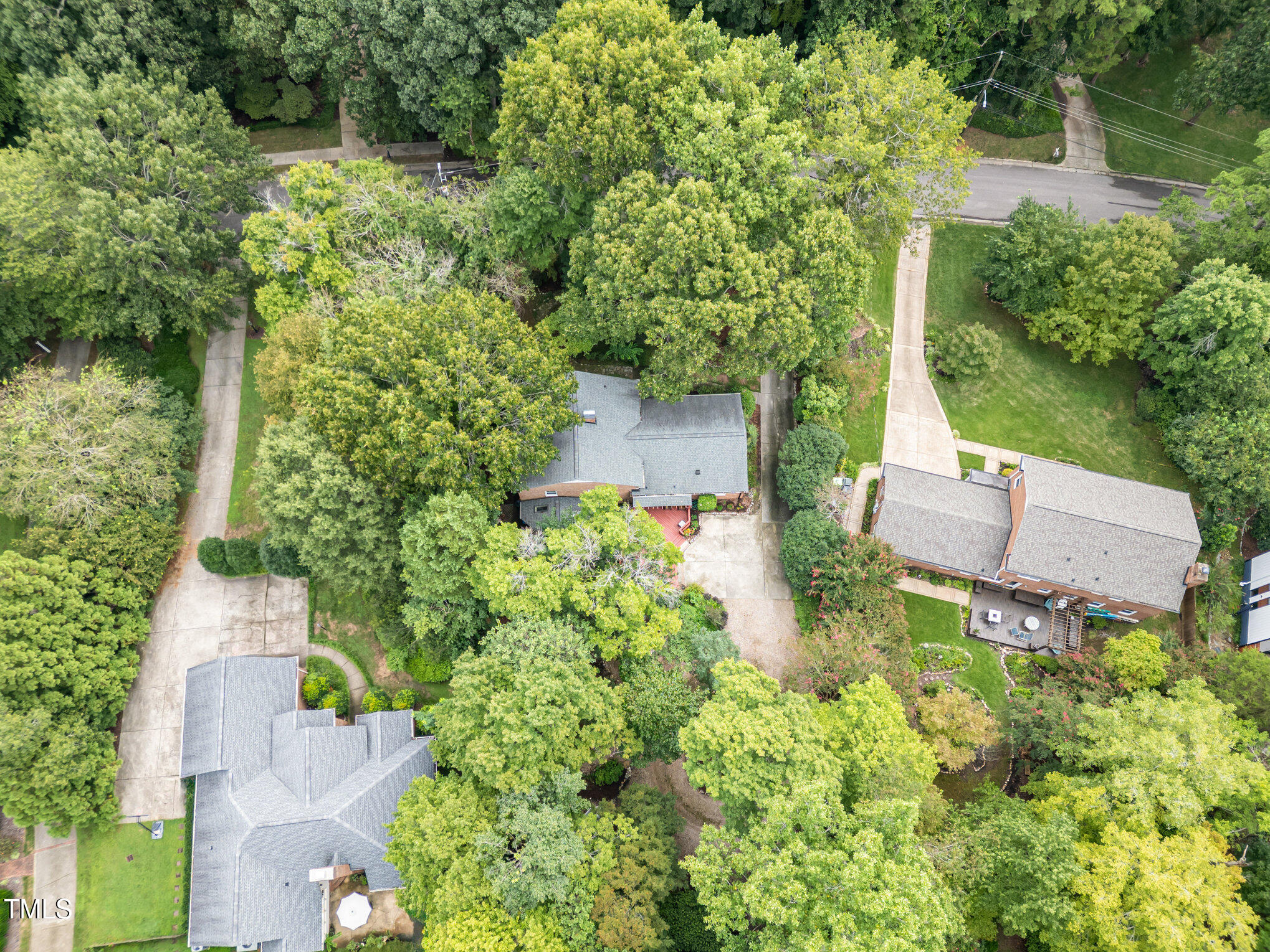 4113 Glen Laurel Drive Raleigh, NC 27612 - Photo 21 of 23 an aerial view of a house with a yard