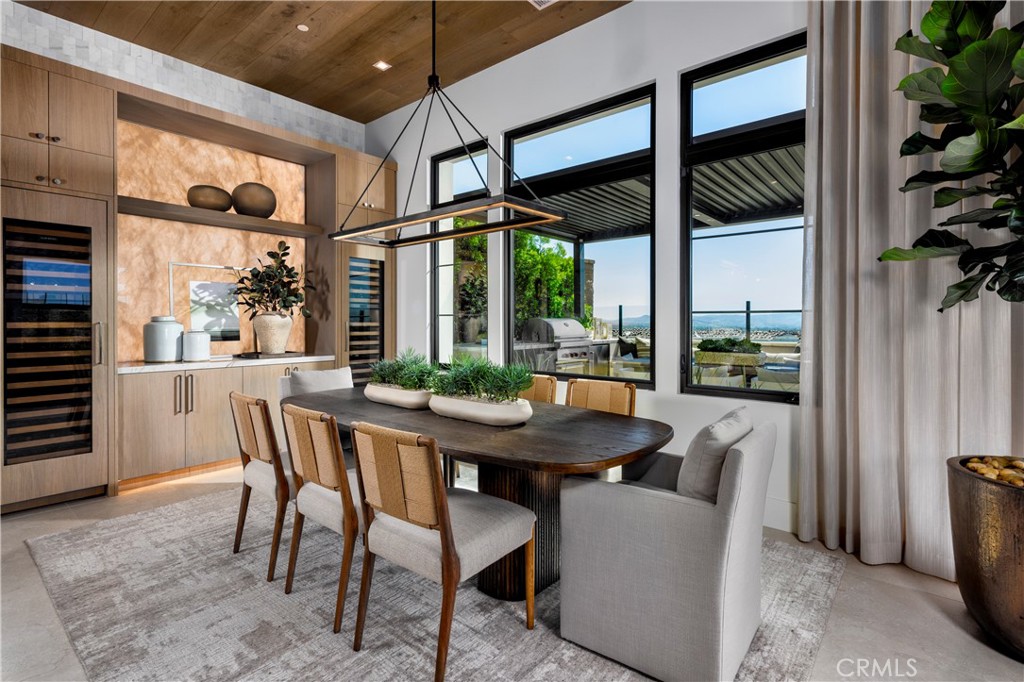564 Peninsula Irvine, CA 92602 - Photo 13 of 20 a dining room with furniture and window