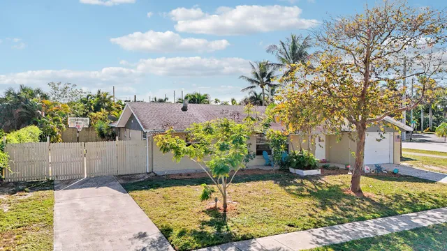 a front view of a house with a garage