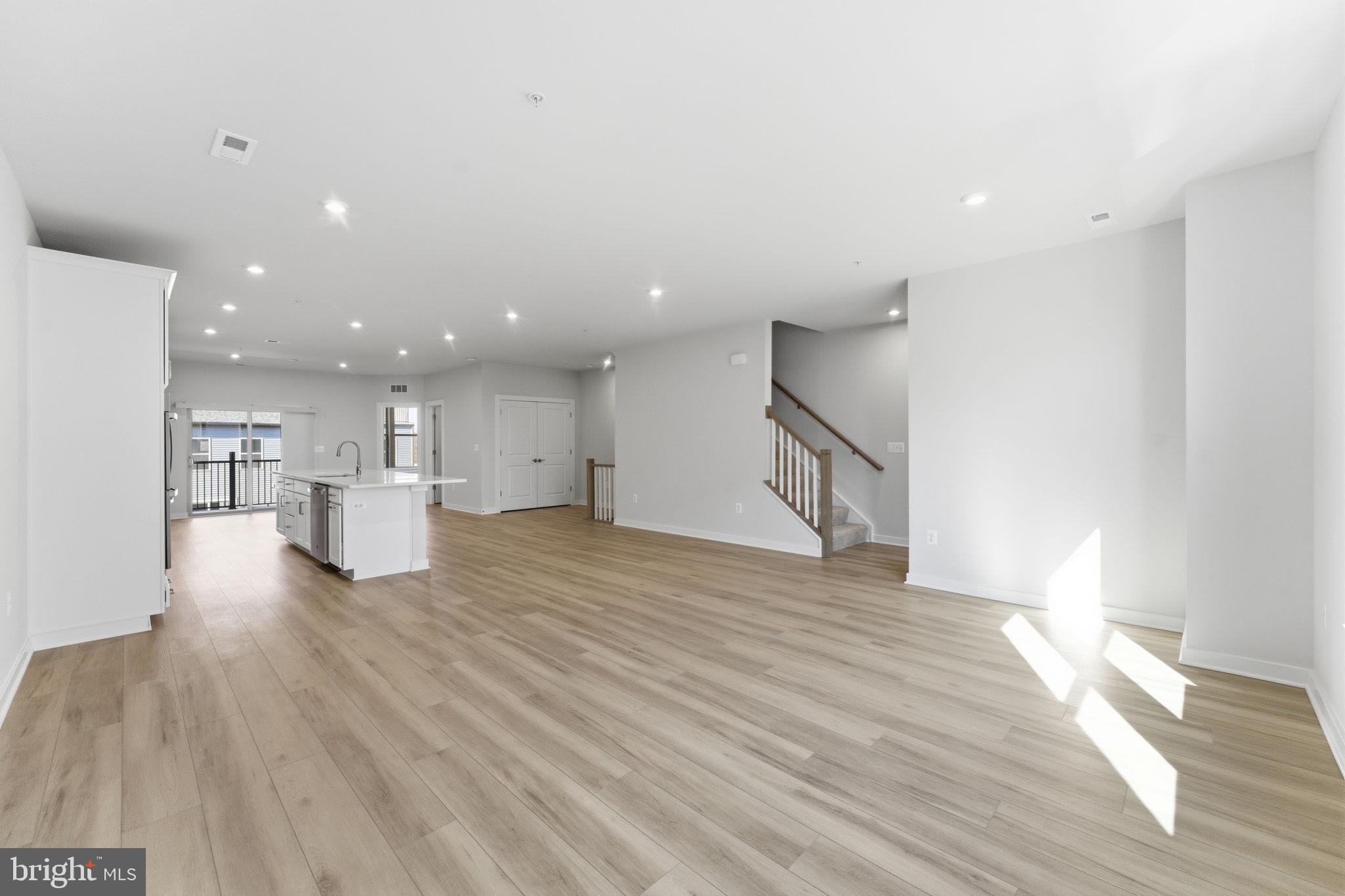 2136 Glacier Road Herndon, VA 20170 - Photo 17 of 79 a view of a kitchen with a sink and a refrigerator
