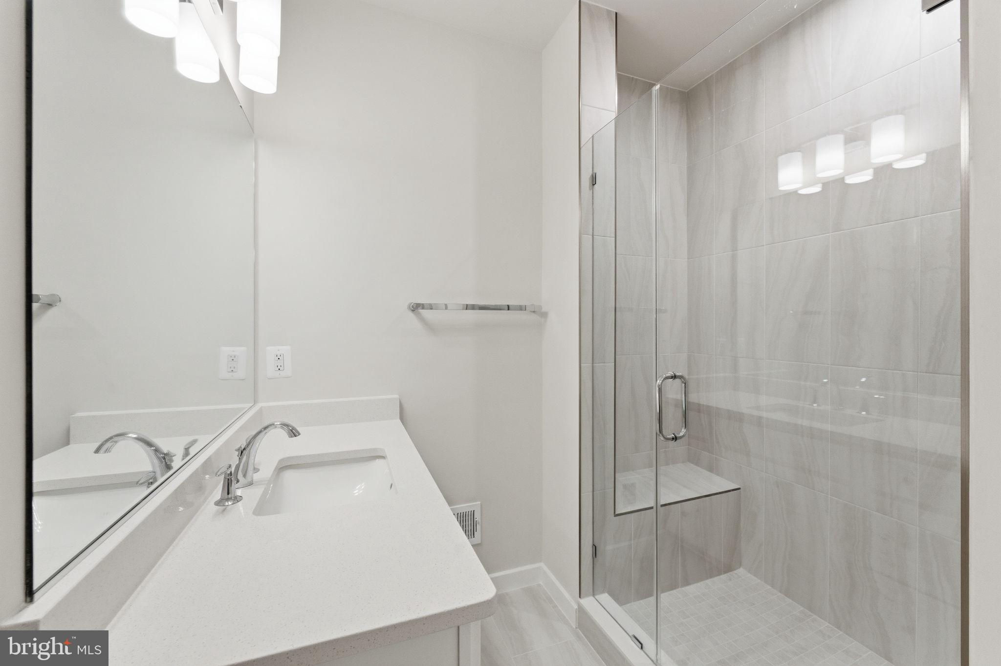 2136 Glacier Road Herndon, VA 20170 - Photo 26 of 79 a bathroom with a sink a toilet and shower