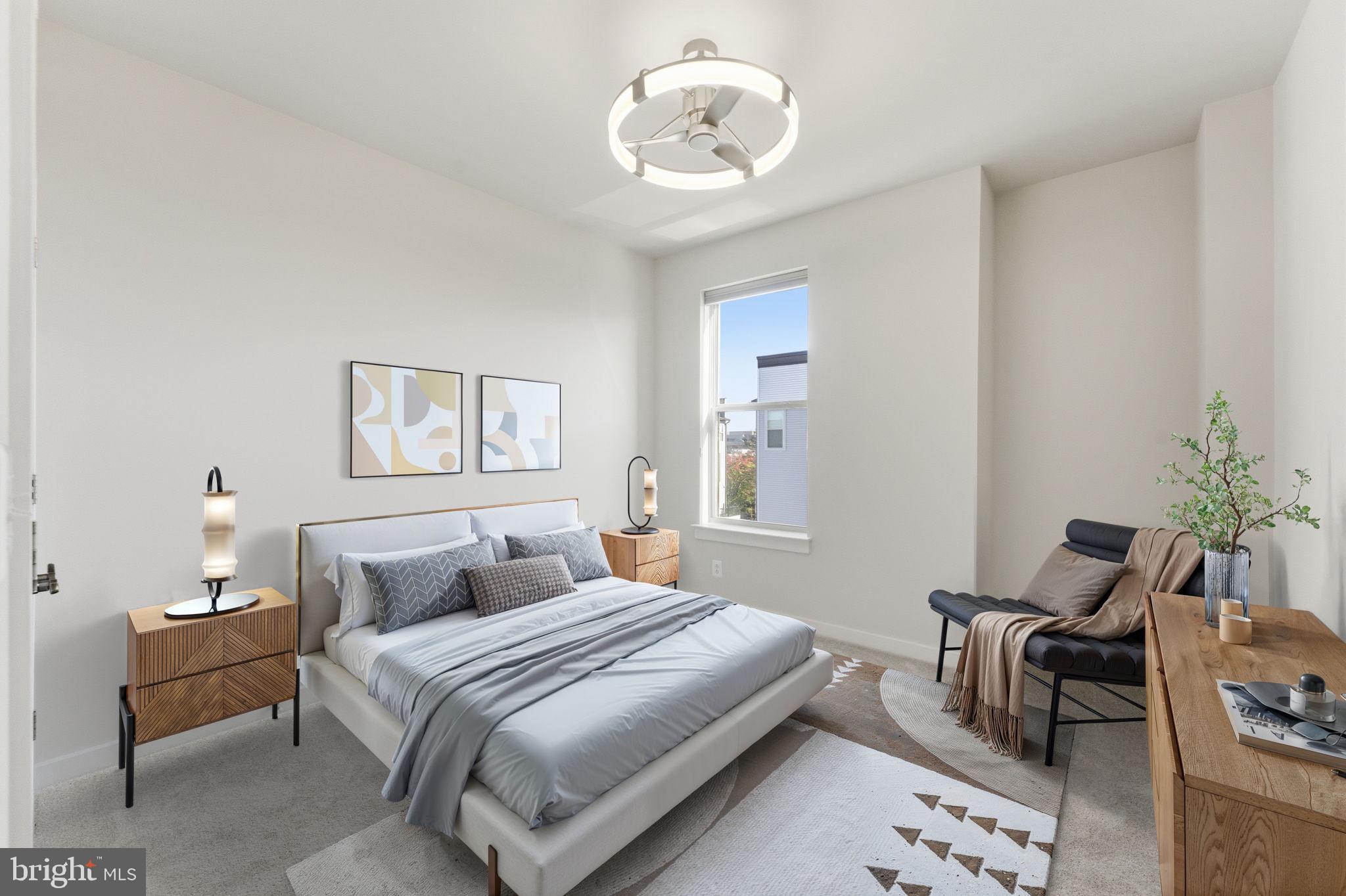 2136 Glacier Road Herndon, VA 20170 - Photo 32 of 79 a bedroom with a bed and a chandelier