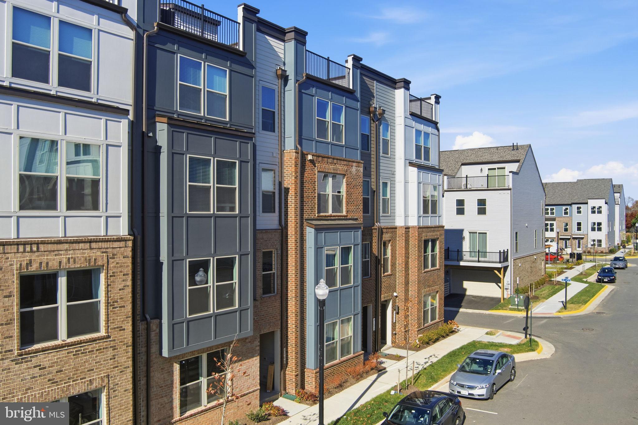 2136 Glacier Road Herndon, VA 20170 - Photo 42 of 79 a view of a building with many windows