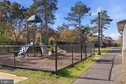 a front view of a house with outdoor space