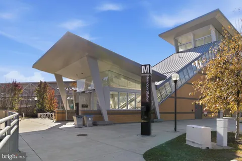 a view of a building with sitting area