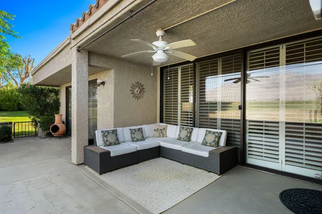 a balcony with furniture and a couch
