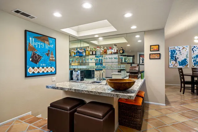 a room with furniture and a painting