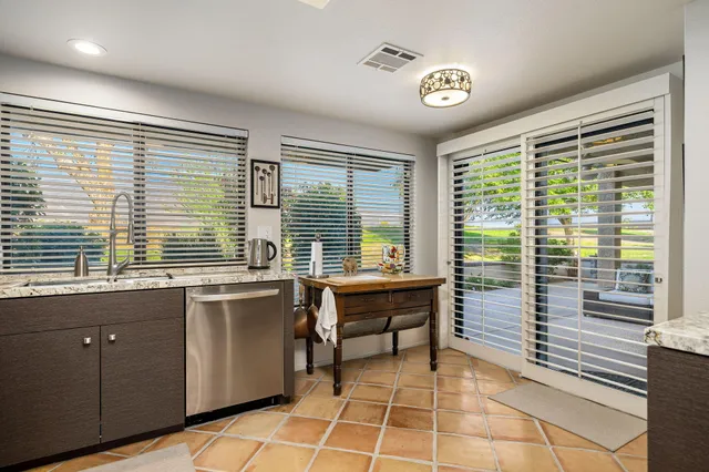 a view of a room with a large window