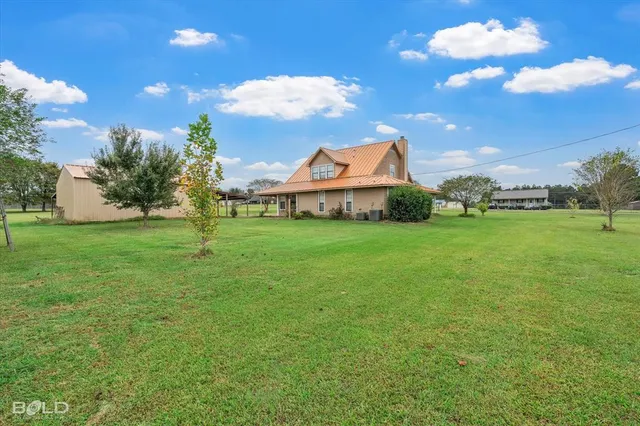 a view of a playground with a garden