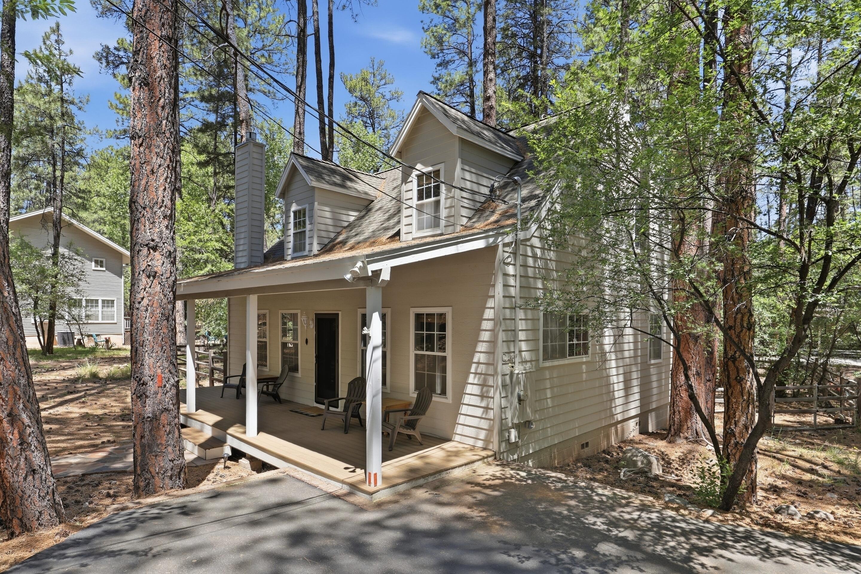 6322 Sharyn Road Pine, AZ 85544 - Photo 2 of 37 a view of a house with a yard