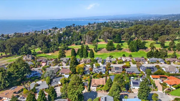 an aerial view of multiple house