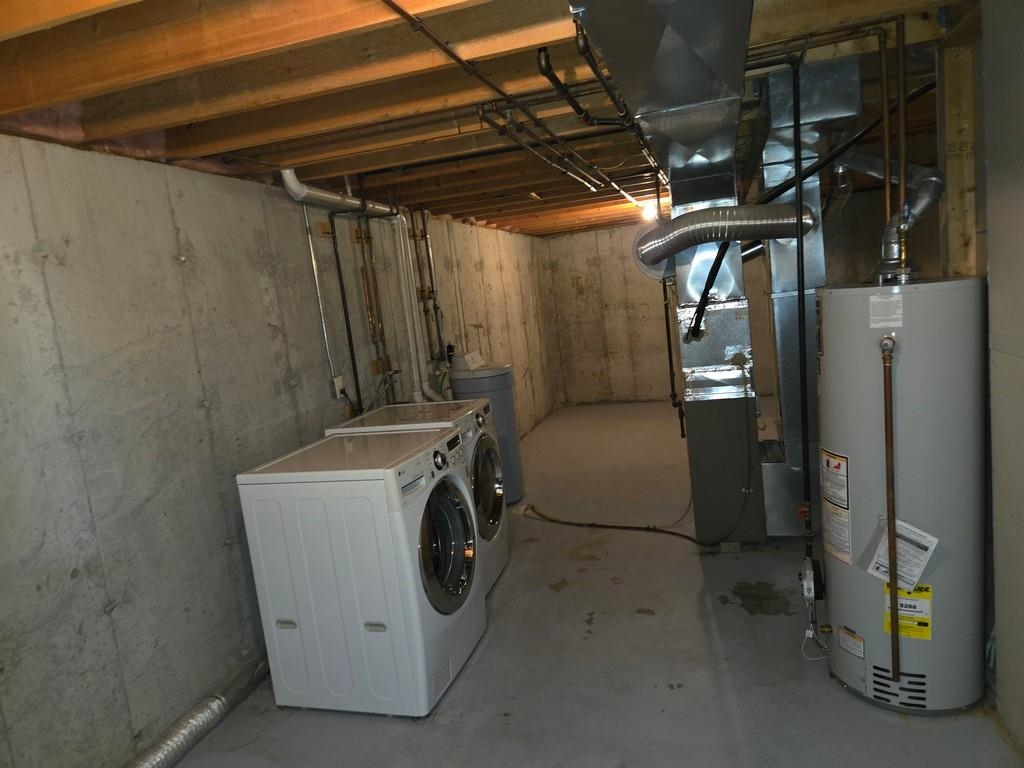 5563 Stockton Drive Rockford, IL 61109 - Photo 20 of 29 a utility room with dryer and washer