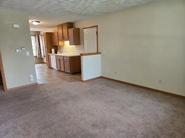a view of a kitchen with a sink