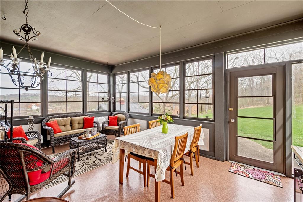 103 Yorktown Road Canonsburg, PA 15317 - Photo 7 of 25 An awesome Sun Room off of the Kitchen with custom windows on every wall.