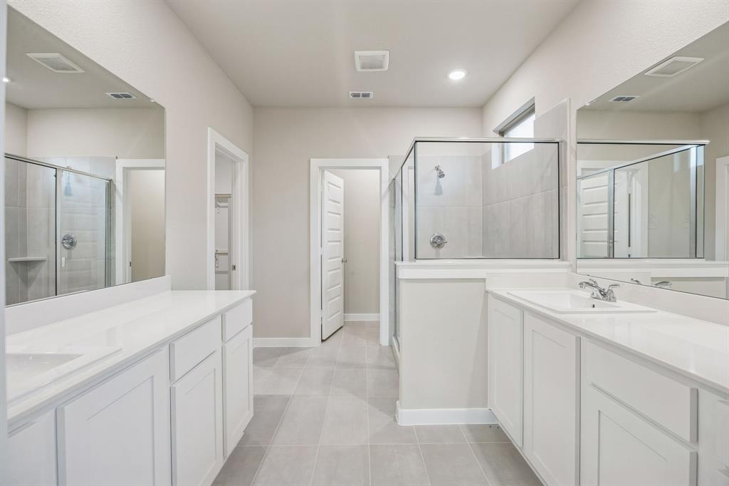 1404 Companero Street Haslet, TX 76052 - Photo 21 of 40 Primary Bathroom in the Wimbledon home plan by Trophy Signature Homes – REPRESENTATIVE PHOTO