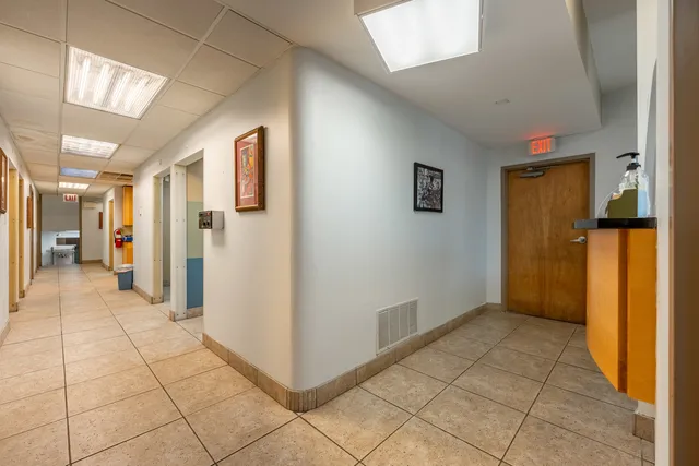 a workspace with table and chairs