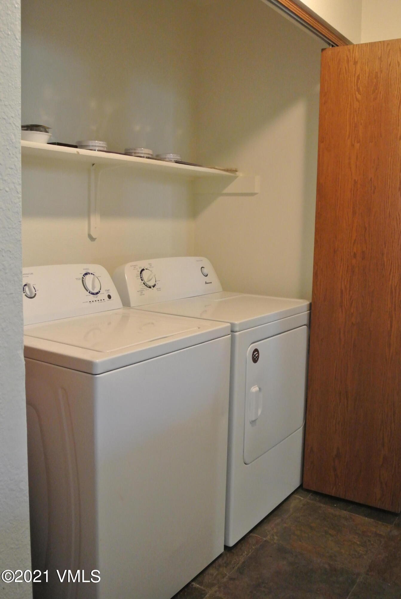 170 Eagle Road, Unit C Avon, CO 81620 - Photo 14 of 16 a utility room with dryer and washer