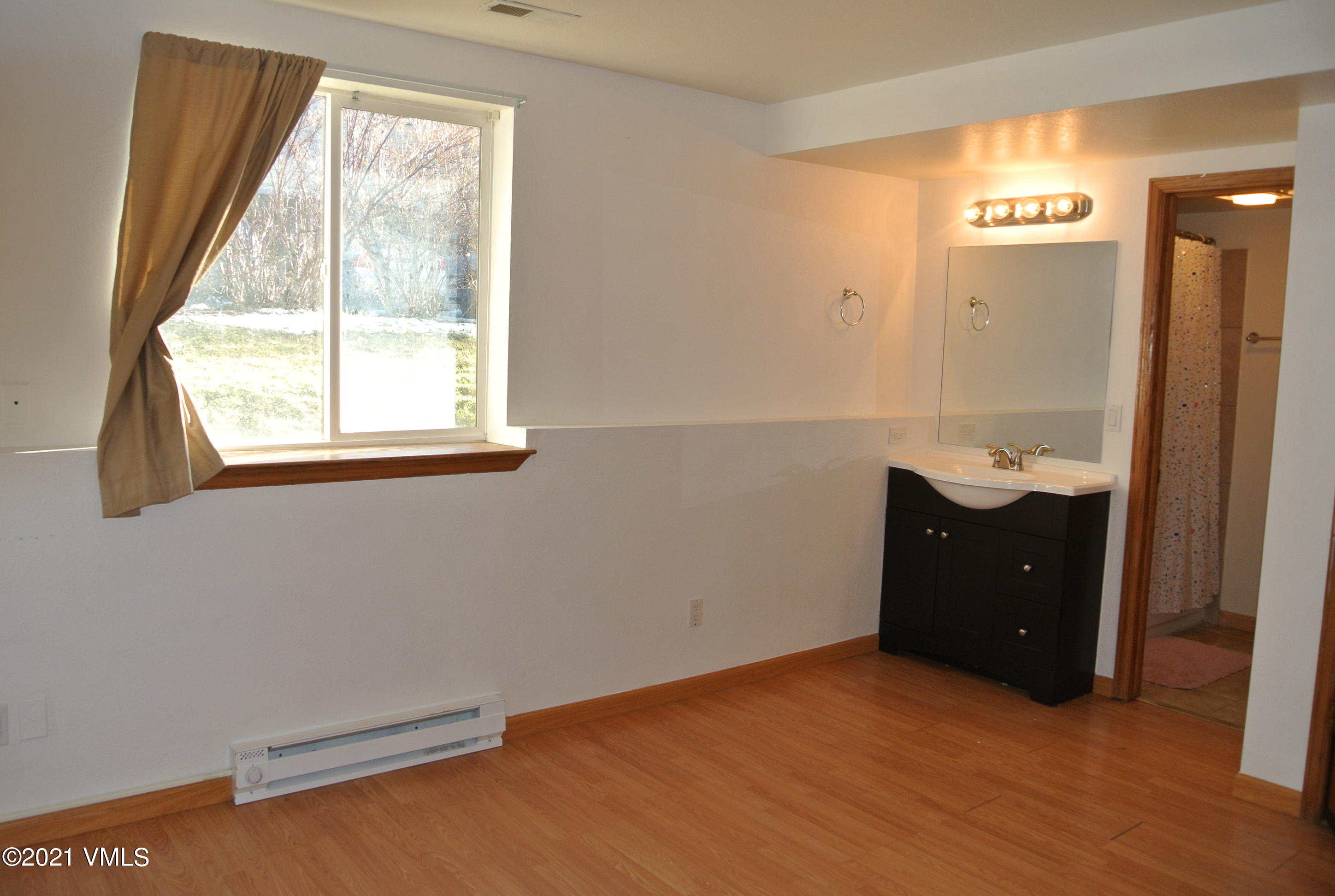 170 Eagle Road, Unit C Avon, CO 81620 - Photo 16 of 16 an empty room with a window