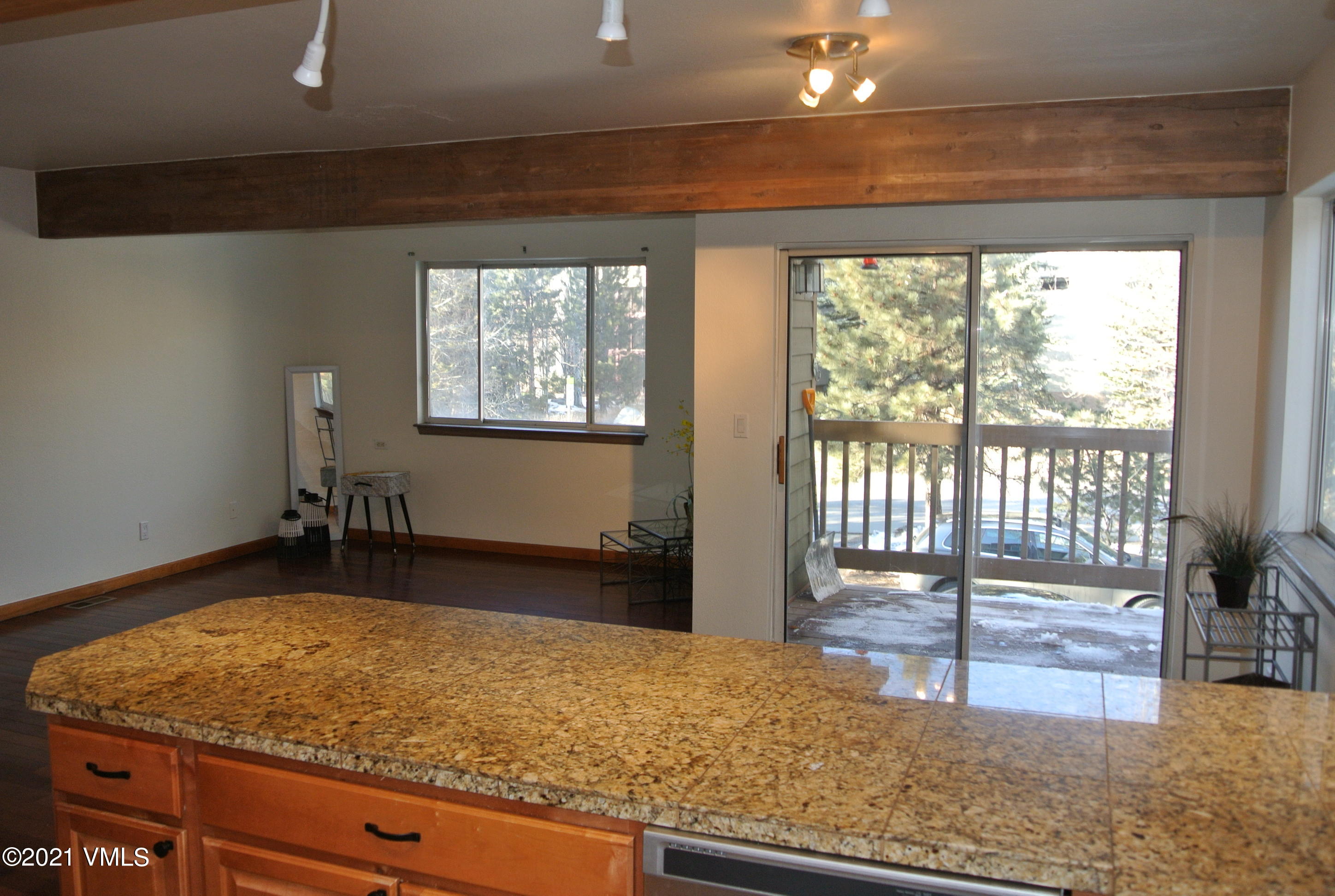 170 Eagle Road, Unit C Avon, CO 81620 - Photo 3 of 16 a room with a balcony