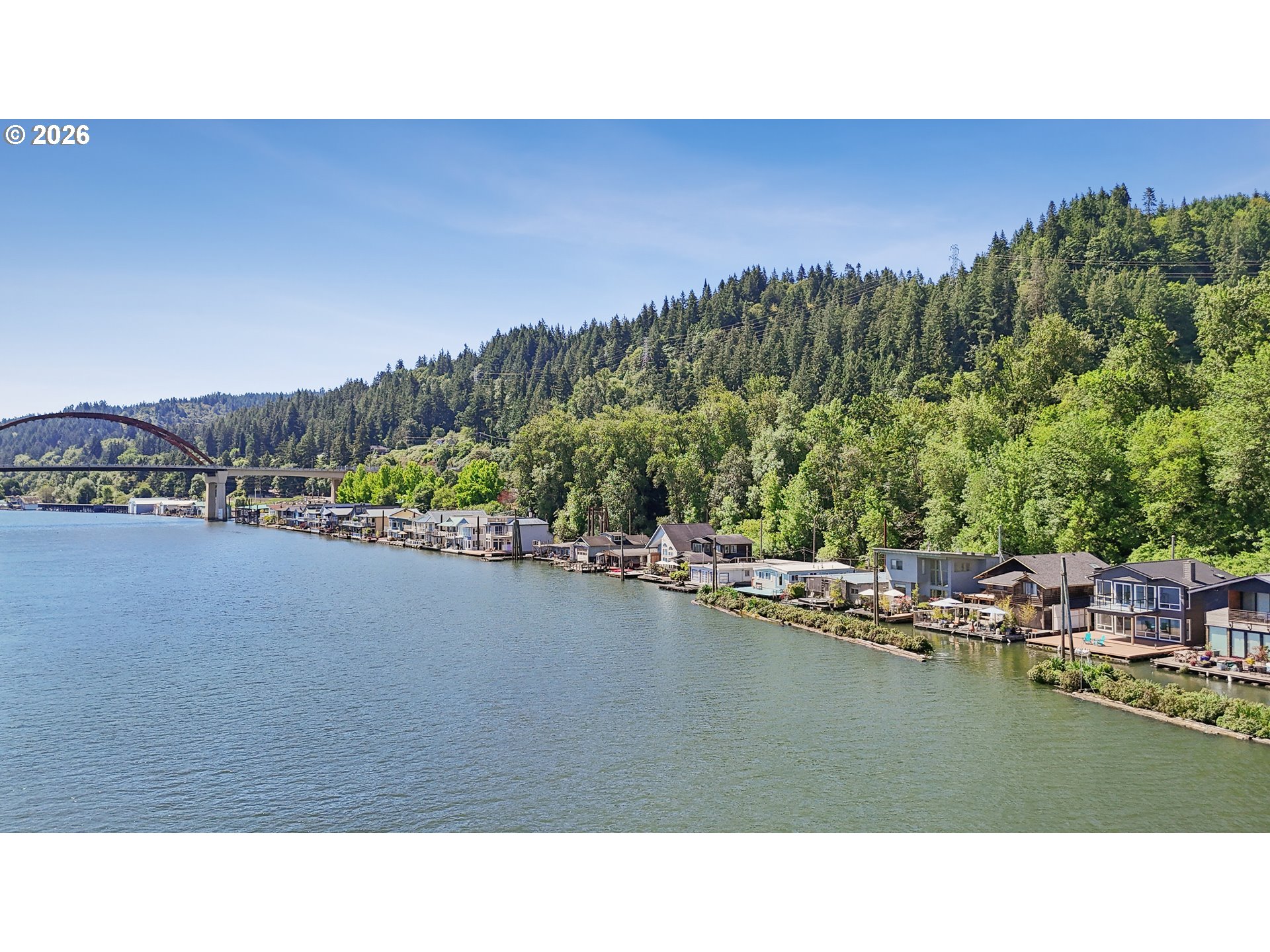 14936 Northwest Mill Road, Unit K Portland, OR 97231 - Photo 27 of 33 a black and white photo of a lake