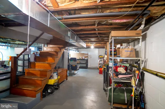 a view of a deck with wooden floor and a furniture