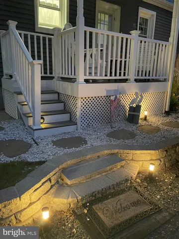 a view of a porch with a chairs