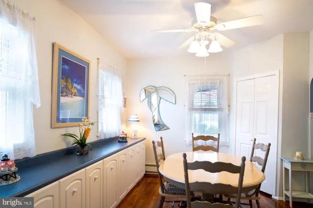 a room with chandelier furniture and windows