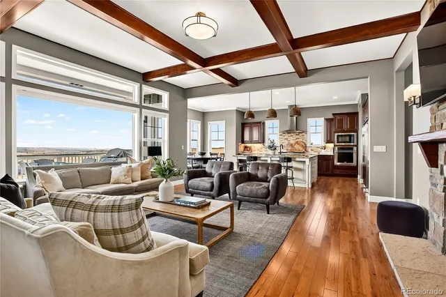 a view of a balcony with wooden floor