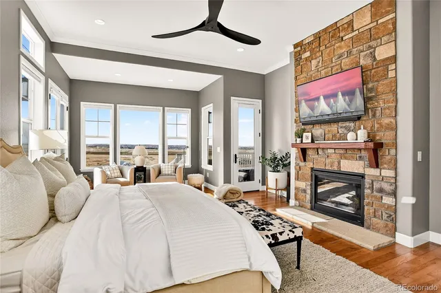 a balcony with furniture and a window