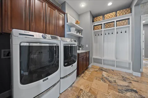 a living room with furniture and a view of bedroom