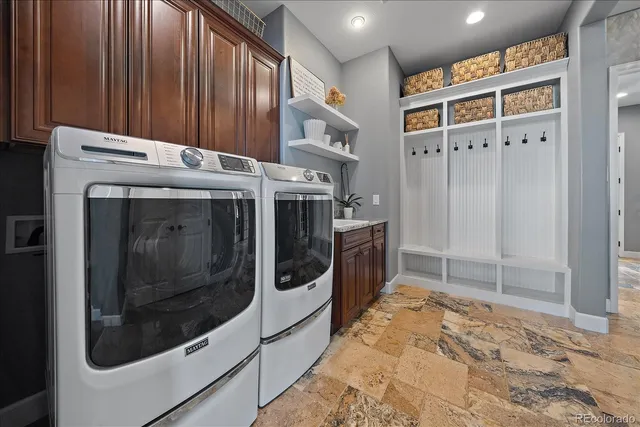 a living room with furniture and a view of bedroom