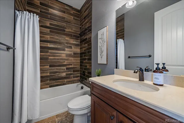 a bedroom with a bed and a table