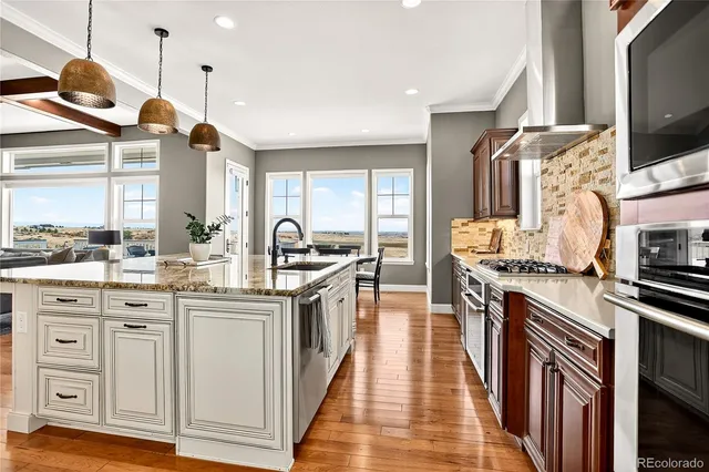 a view of a dining room with furniture and window