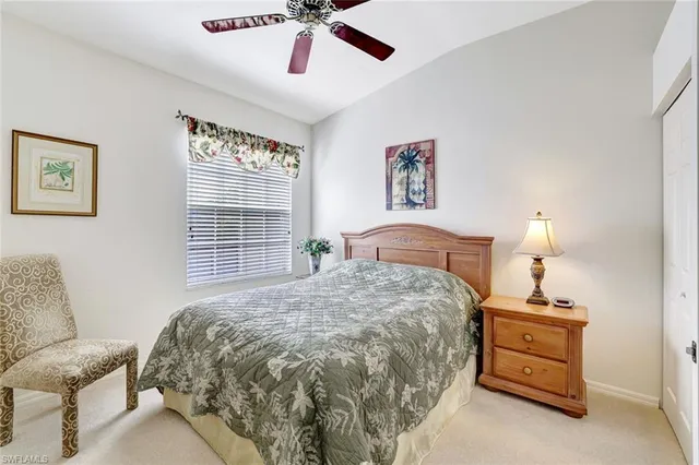a spacious bathroom with a shower sink and mirror