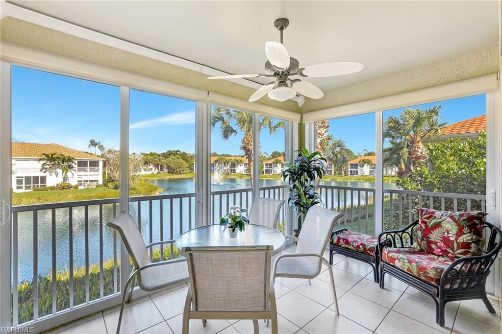 10910 Santa Margherita Road, Unit 204 Estero, FL 34135 - Photo 21 of 42 Sunroom / solarium featuring a water view and tile patterned floors